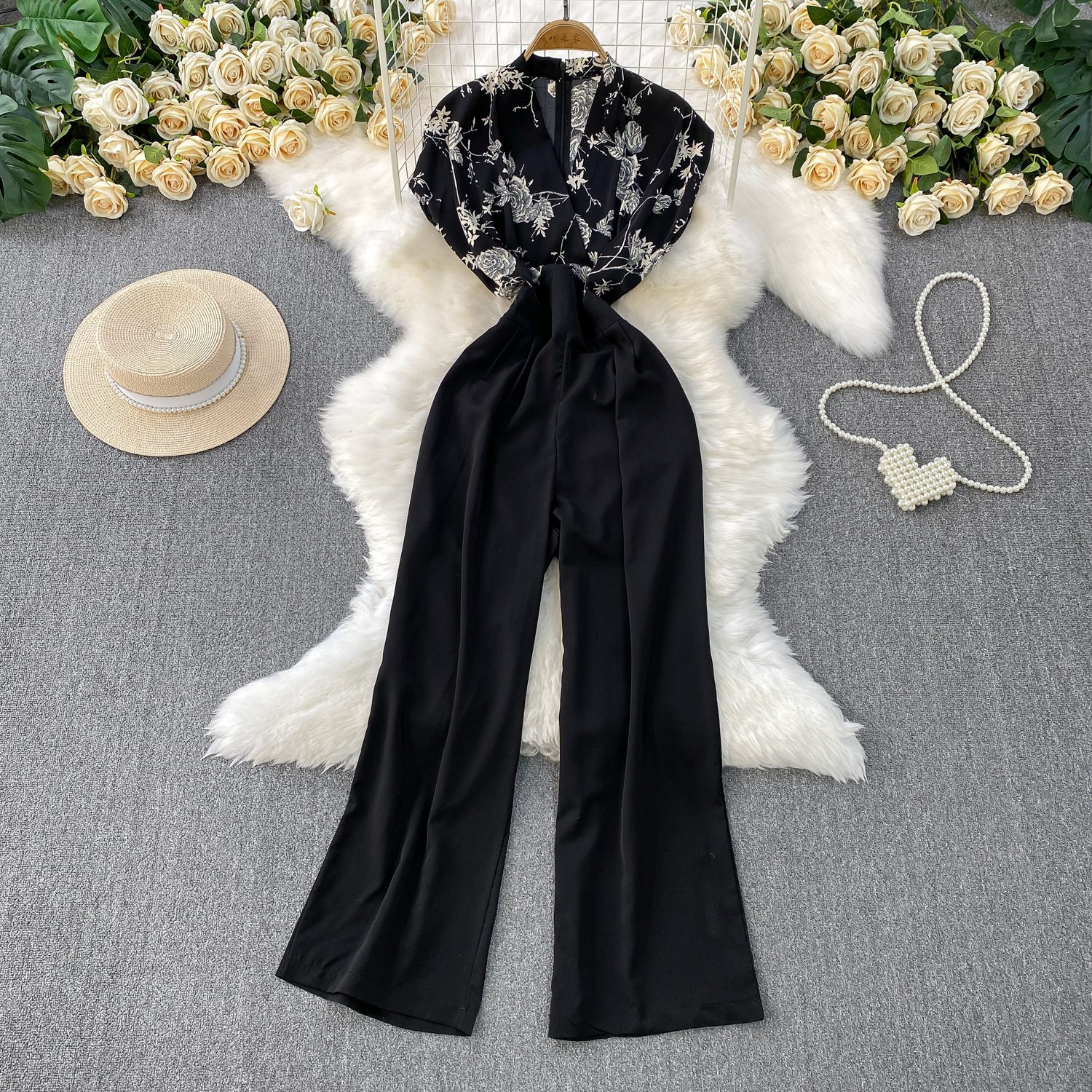 Advanced and elegant temperament print splicing V-neck short sleeved jumpsuit for women's summer new collection, waist cinching and slimming wide leg pants Advanced and elegant temperament print splicing V-neck short sleeved jumpsuit for women's summer new collection, waist cinching and slimming wide leg pants