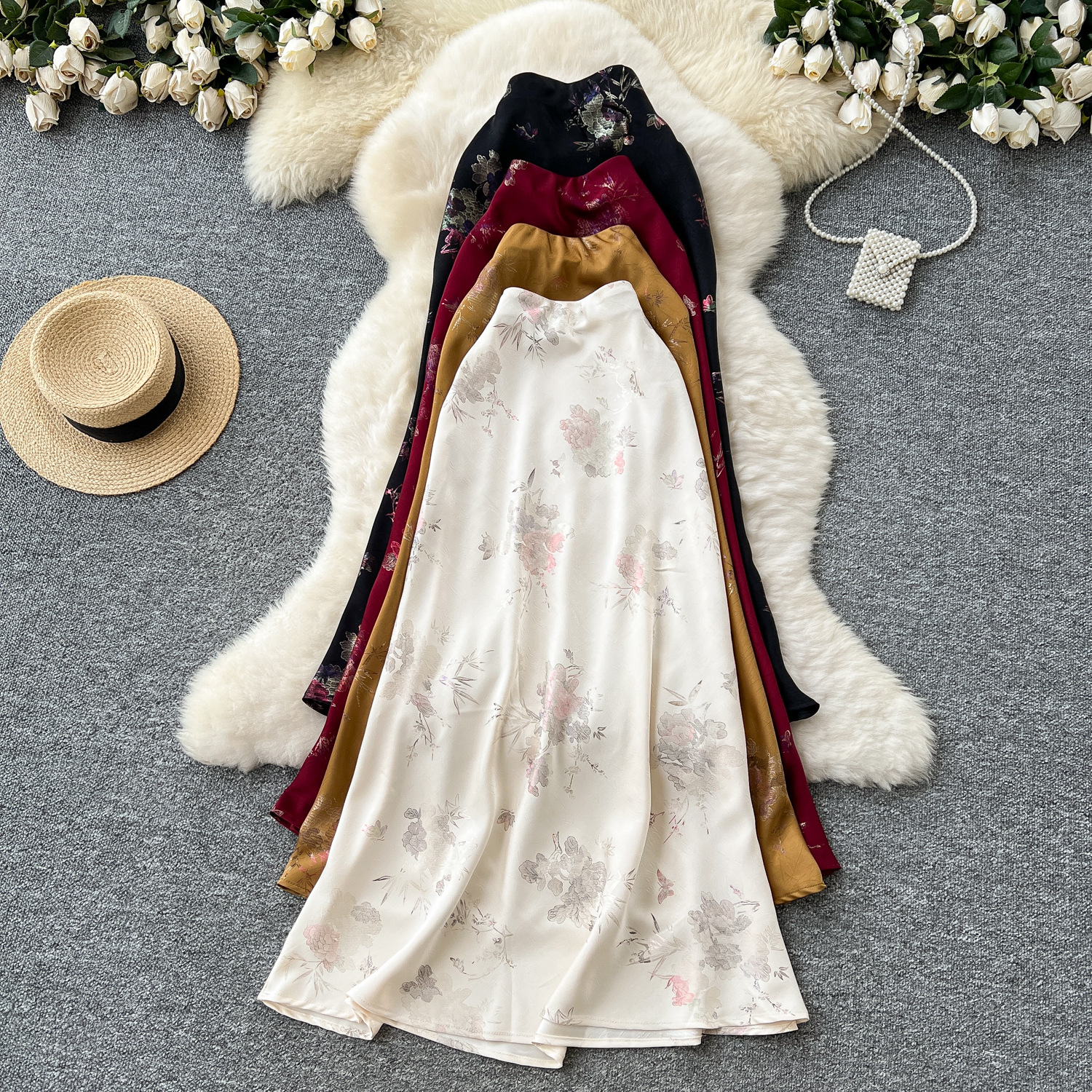 Light mature style, high-end feeling, hot stamping, printed fish tail skirt, women's 2025 summer high waist slimming satin bread buttocks mid length skirt