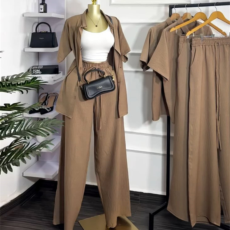 European and American cross-border women's clothing 2025 summer new casual lapel loose short sleeved shirt wide leg pants fashion set European and American cross-border women's clothing 2025 summer new casual lapel loose short sleeved shirt wide leg pants fashion set
