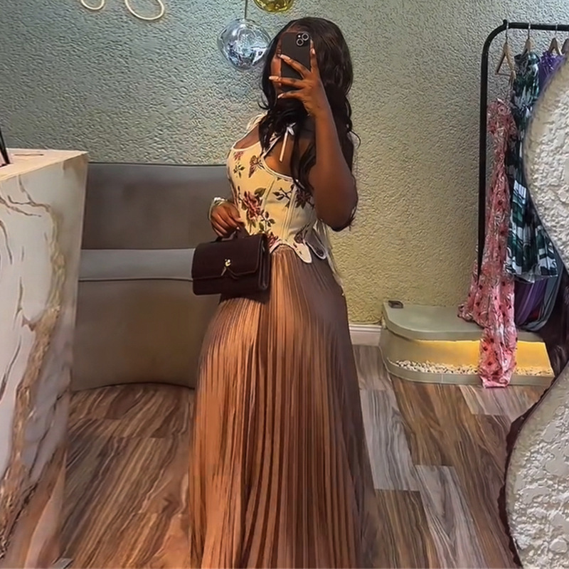 European and American women's clothing 2025 summer new sweet and fresh printed waist collection vest high waist half body pleated skirt two-piece set European and American women's clothing 2025 summer new sweet and fresh printed waist collection vest high waist half body pleated skirt two-piece set