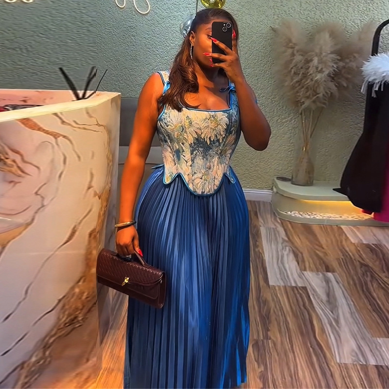 European and American women's clothing 2025 summer new sweet and fresh printed waist collection vest high waist half body pleated skirt two-piece set European and American women's clothing 2025 summer new sweet and fresh printed waist collection vest high waist half body pleated skirt two-piece set