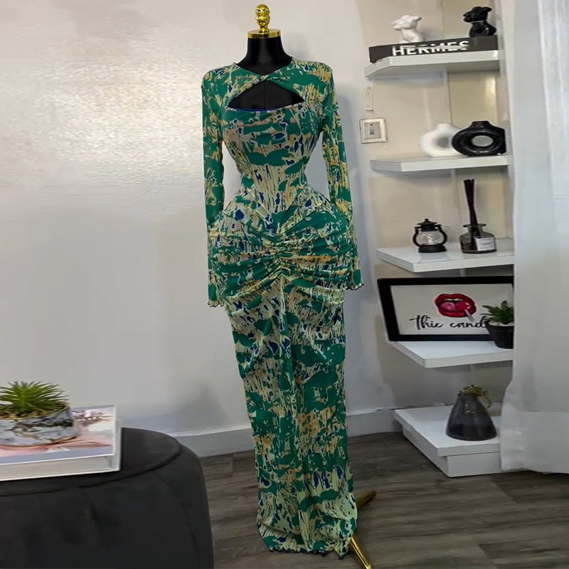 In stock 2025 cross-border European and American style printed long sleeved hollow pleated high waisted sexy vacation dress long skirt In stock 2025 cross-border European and American style printed long sleeved hollow pleated high waisted sexy vacation dress long skirt