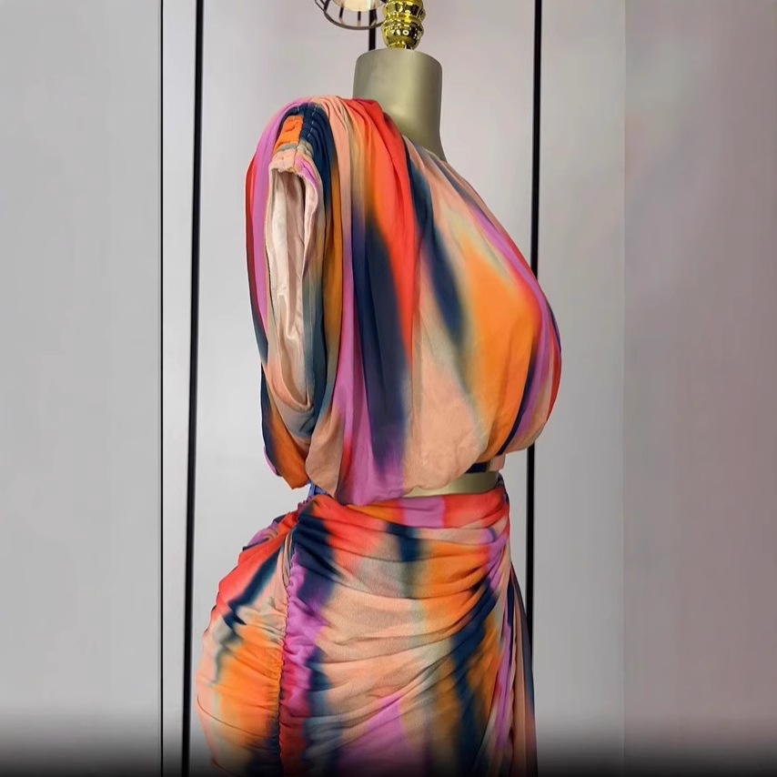 In stock 2025 summer European and American round neck high-end sleeveless pleated tie dye printed top+short skirt 2-piece set In stock 2025 summer European and American round neck high-end sleeveless pleated tie dye printed top+short skirt 2-piece set