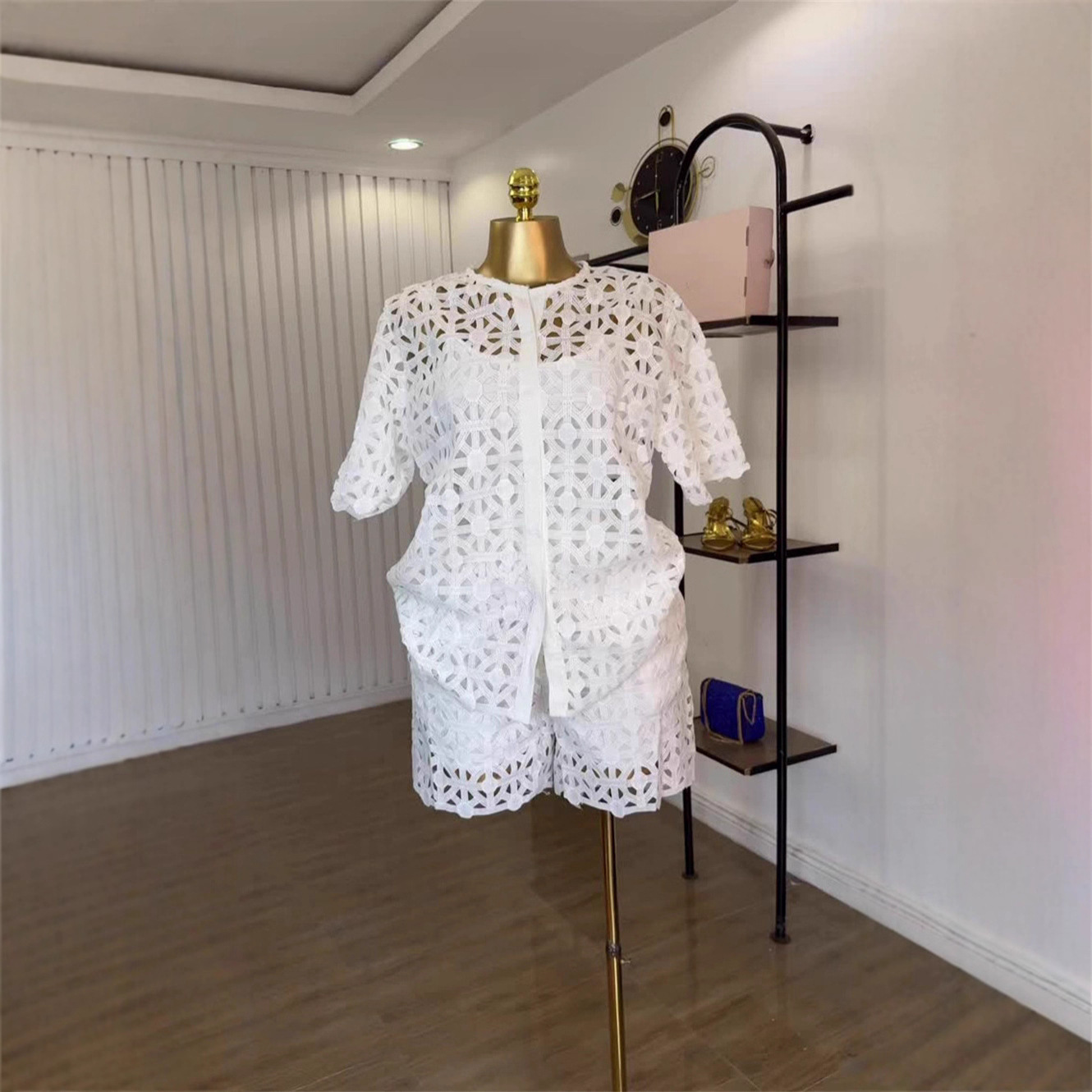 Spot 2025 European and American Cross border Women's Fashion Round Neck Hollow Short Sleeve Shirt Wide Leg Shorts Casual 2-piece Set Spot 2025 European and American Cross border Women's Fashion Round Neck Hollow Short Sleeve Shirt Wide Leg Shorts Casual 2-piece Set