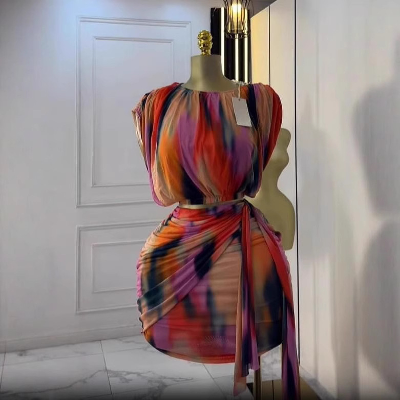 In stock 2025 summer European and American round neck high-end sleeveless pleated tie dye printed top+short skirt 2-piece set In stock 2025 summer European and American round neck high-end sleeveless pleated tie dye printed top+short skirt 2-piece set