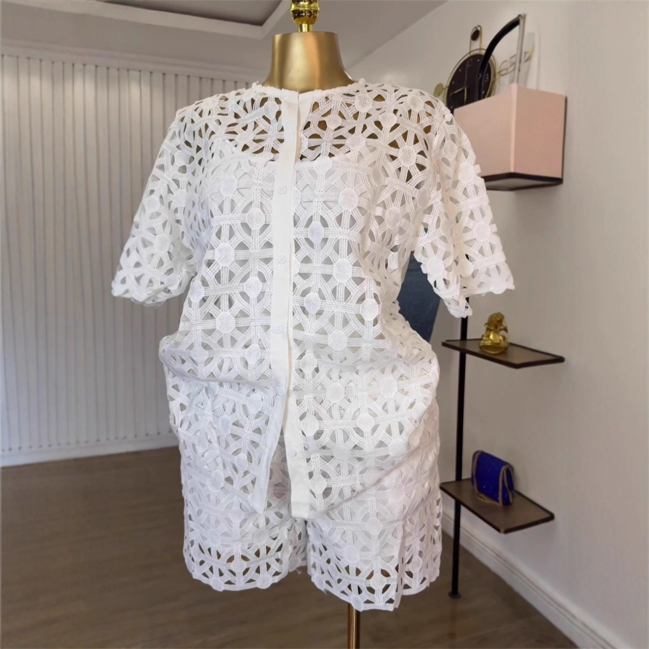 Spot 2025 European and American Cross border Women's Fashion Round Neck Hollow Short Sleeve Shirt Wide Leg Shorts Casual 2-piece Set Spot 2025 European and American Cross border Women's Fashion Round Neck Hollow Short Sleeve Shirt Wide Leg Shorts Casual 2-piece Set