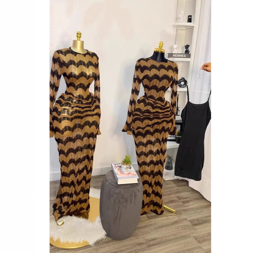 In stock 2025 cross-border European and American striped long sleeved pleated high waisted sexy vacation dress, long skirt 2 pieces including interior