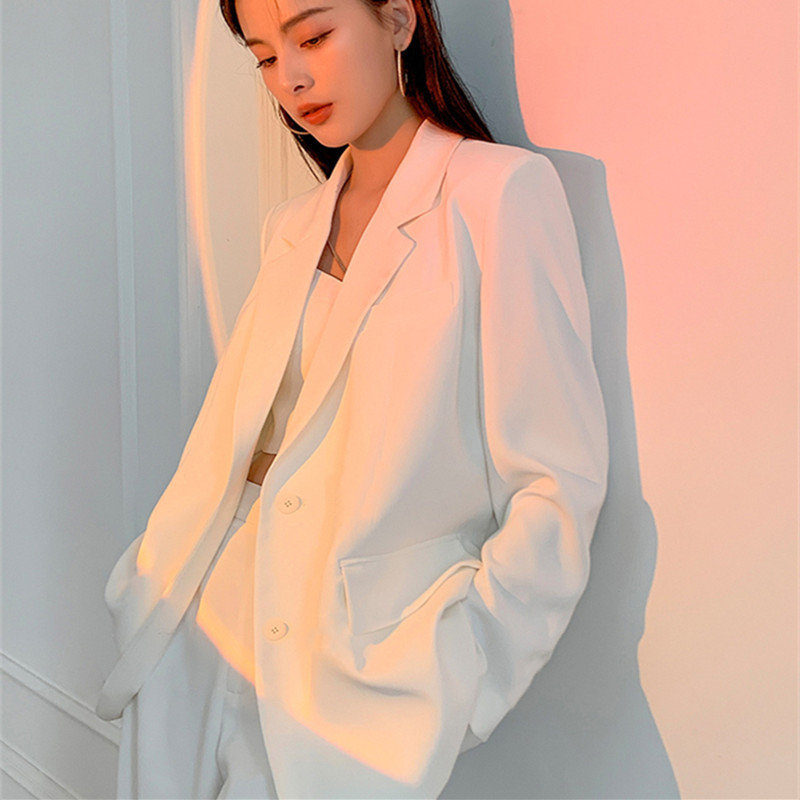 White suit jacket for women with a sense of luxury in spring and autumn, thin Korean version, loose design, niche long sleeved casual small suit