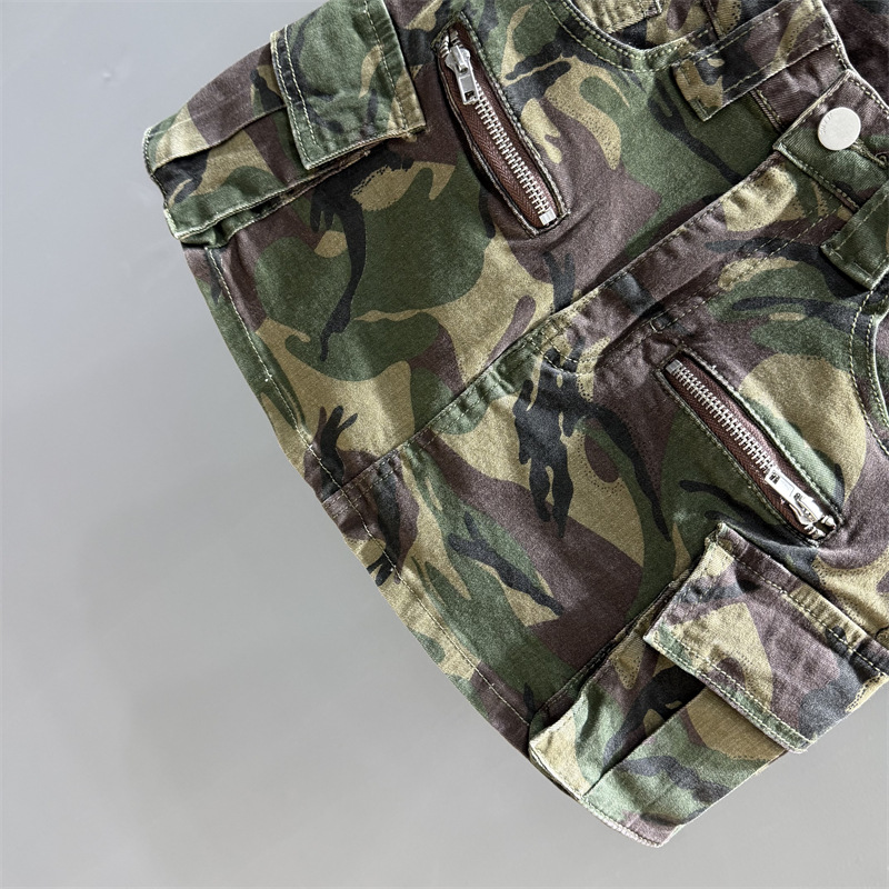 Retro camouflage green denim short skirt for women in summer 2025, high waisted and slim looking spicy girl A-line hip hugging skirt, workwear half skirt Retro camouflage green denim short skirt for women in summer 2025, high waisted and slim looking spicy girl A-line hip hugging skirt, workwear half skirt