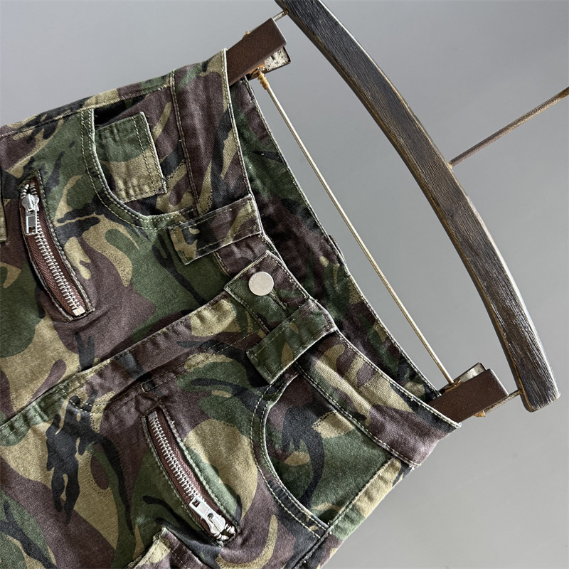 Retro camouflage green denim short skirt for women in summer 2025, high waisted and slim looking spicy girl A-line hip hugging skirt, workwear half skirt Retro camouflage green denim short skirt for women in summer 2025, high waisted and slim looking spicy girl A-line hip hugging skirt, workwear half skirt