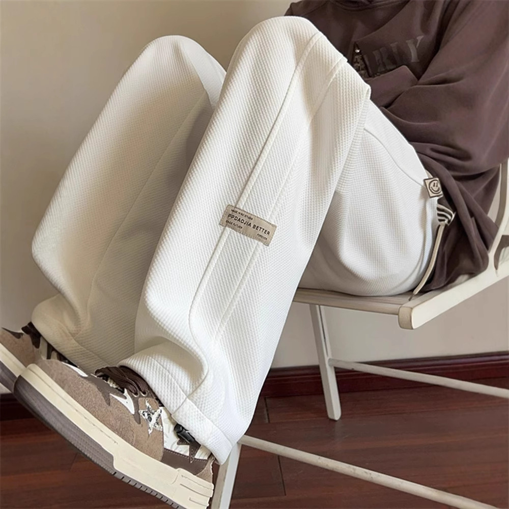 Black straight leg casual pants for men, spring and autumn American fashion trend for teenagers, loose and wide leg sports hanging pants