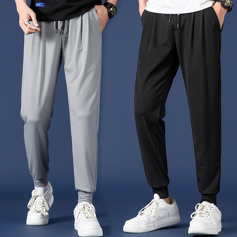 Mesh ice silk pants for men in spring and summer, loose fit, plus size, ankle binding, sporty, breathable, nine point casual pants, trendy men's pants