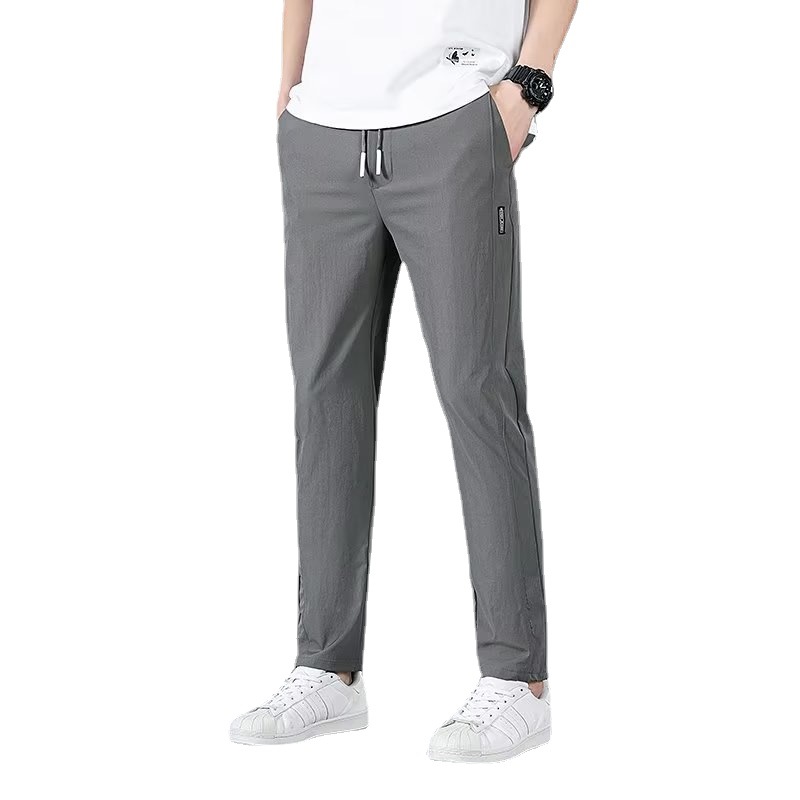 New autumn and winter clothing with black label and fleece pants for men's wear, Korean version, large size, thick, business and foreign trade spot pants