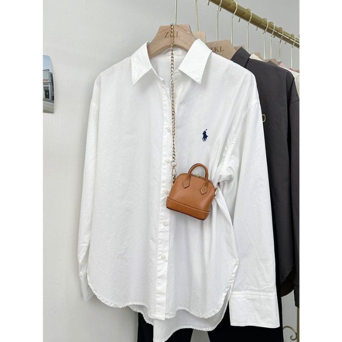 Pony embroidered shirt for women, loose Korean style, simple and high-end design, commuting shirt, fashionable and casual long sleeved top Pony embroidered shirt for women, loose Korean style, simple and high-end design, commuting shirt, fashionable and casual long sleeved top
