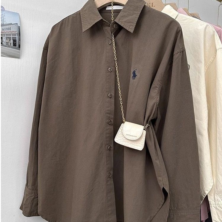 Pony embroidered shirt for women, loose Korean style, simple and high-end design, commuting shirt, fashionable and casual long sleeved top Pony embroidered shirt for women, loose Korean style, simple and high-end design, commuting shirt, fashionable and casual long sleeved top
