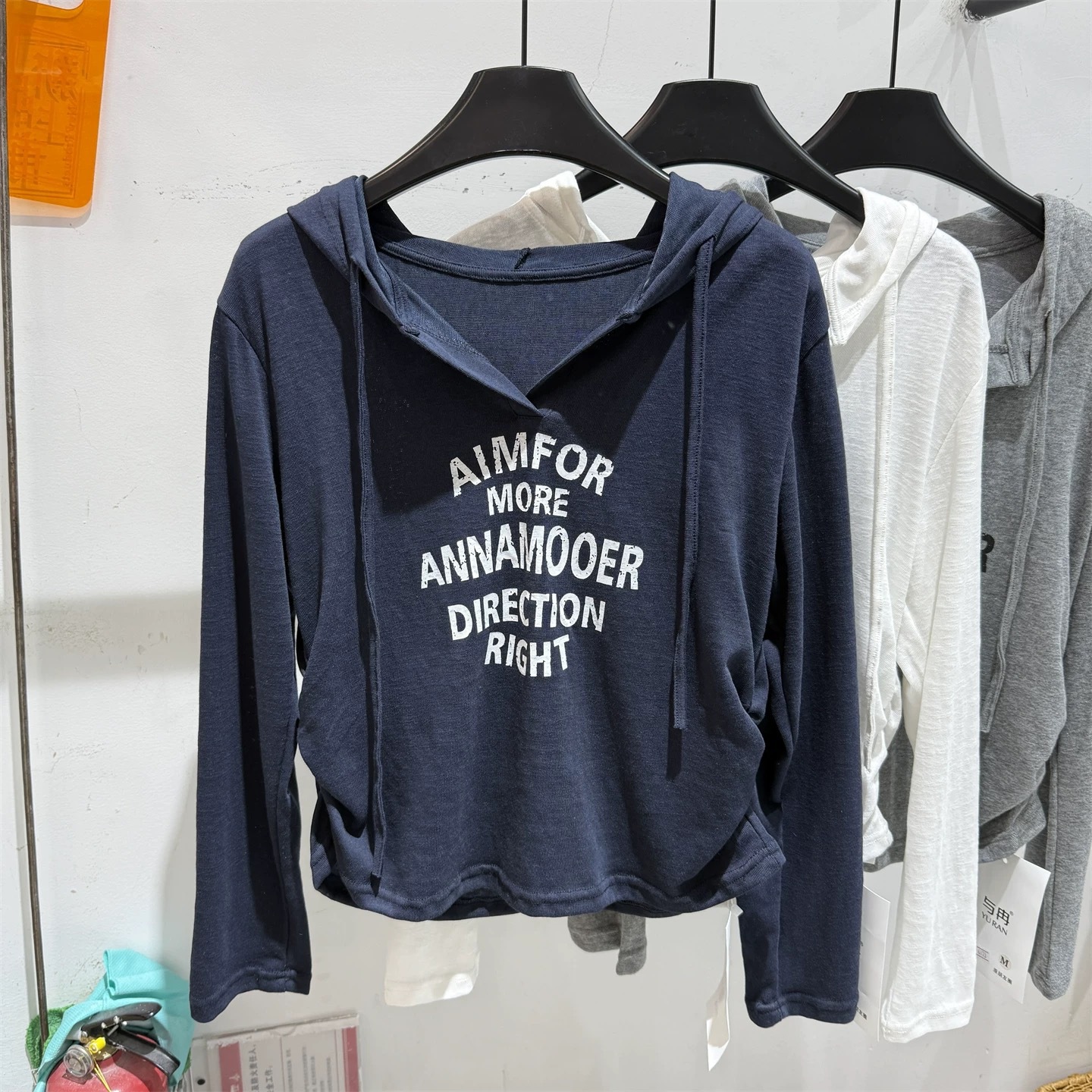 Autumn new fashion letter printed hooded long sleeved T-shirt for women, pleated top Autumn new fashion letter printed hooded long sleeved T-shirt for women, pleated top