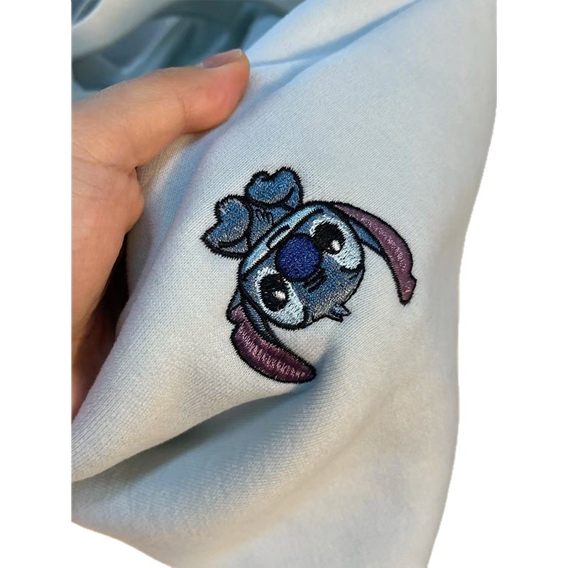 Pure cotton milk blue cute Stitch hooded sweatshirt for women in winter with plush and thick cartoon anti-aging top jacket Pure cotton milk blue cute Stitch hooded sweatshirt for women in winter with plush and thick cartoon anti-aging top jacket