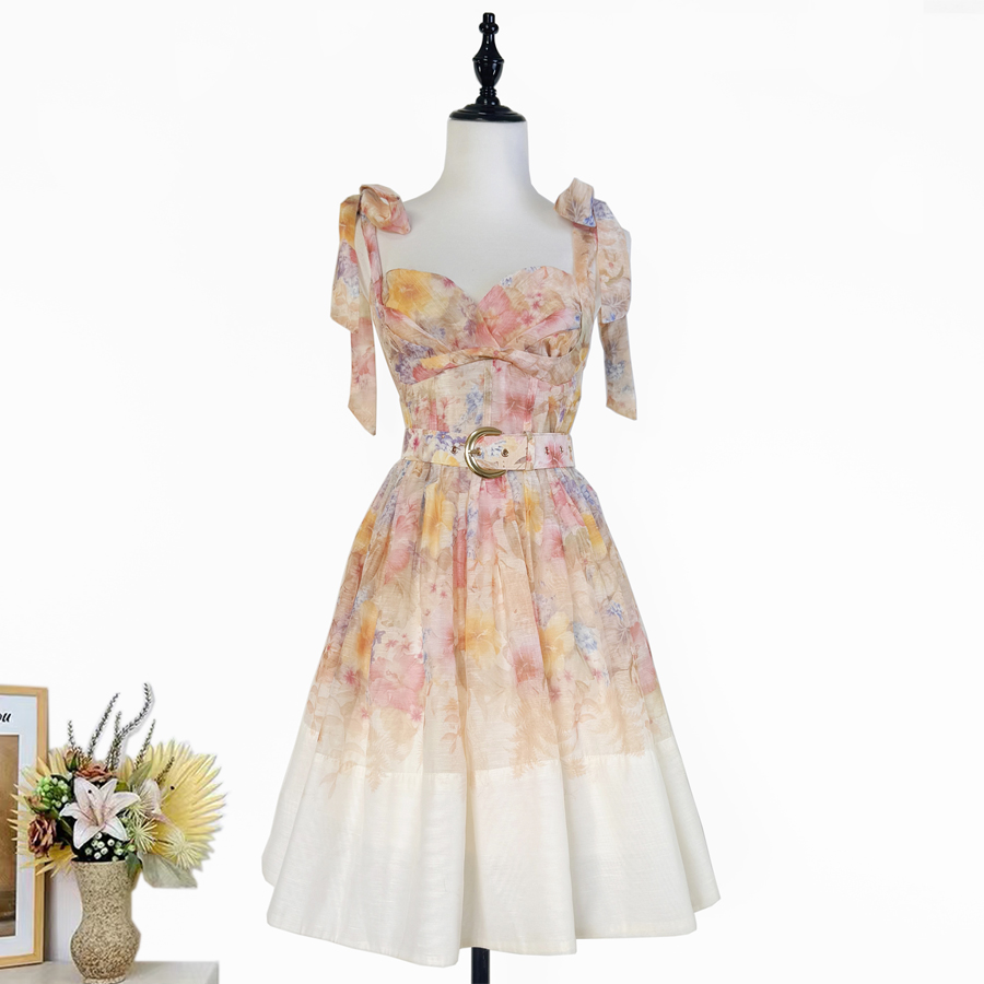 Real shot of a niche Australian socialite with printed bow tie, waist cinching, fluffy dress, short skirt, and belt