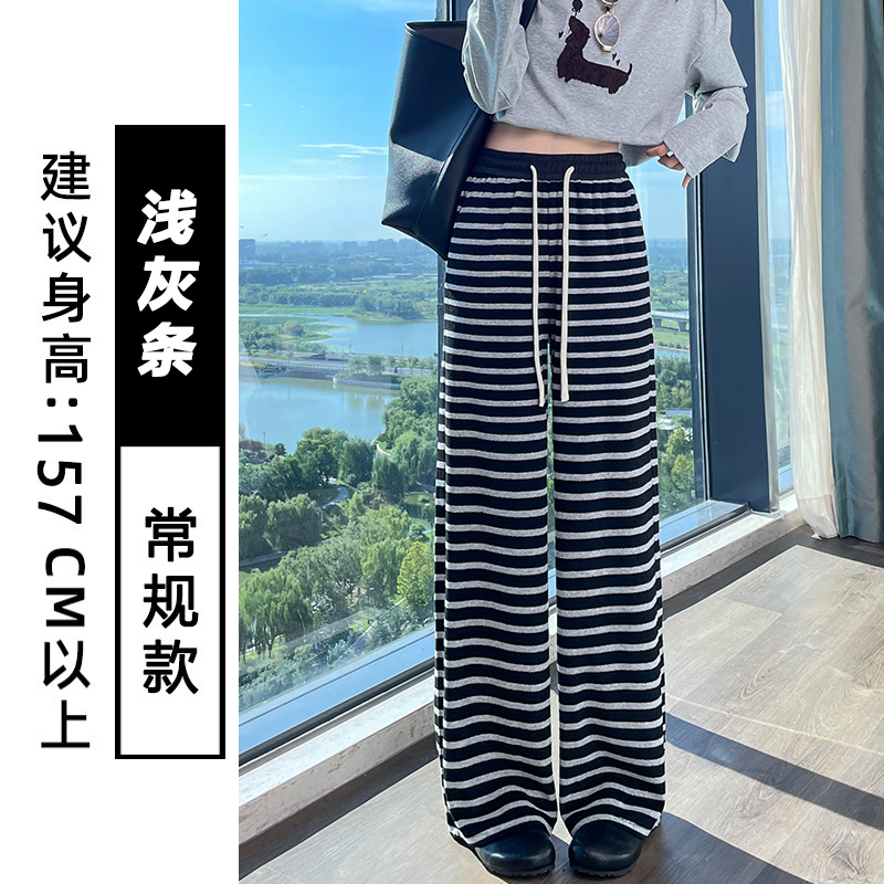 Velvet thickened fashionable striped sports pants for women in autumn and winter 2025, simple temperament, casual and versatile, elastic waisted wide leg pants Velvet thickened fashionable striped sports pants for women in autumn and winter 2025, simple temperament, casual and versatile, elastic waisted wide leg pants