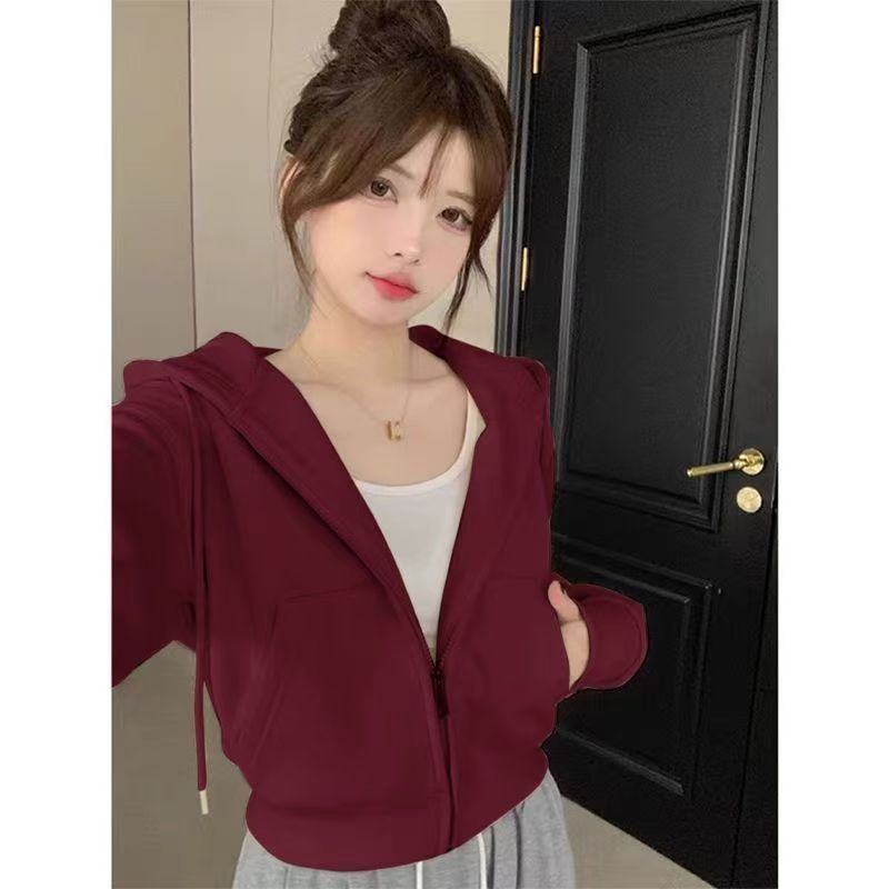 Short zipper hooded sweatshirt for women in early autumn 2025, new small and fashionable style, simple temperament, casual versatile jacket Short zipper hooded sweatshirt for women in early autumn 2025, new small and fashionable style, simple temperament, casual versatile jacket