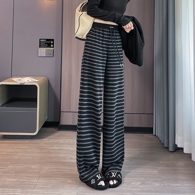 Velvet thickened temperament striped long pants for women in autumn and winter 2025, with a niche and casual design, versatile and elastic waisted wide leg pants Velvet thickened temperament striped long pants for women in autumn and winter 2025, with a niche and casual design, versatile and elastic waisted wide leg pants
