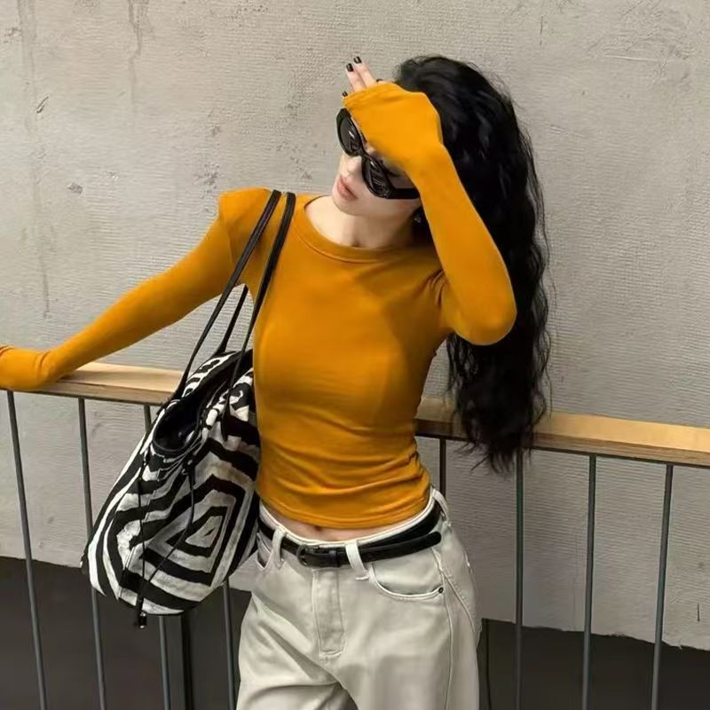 Short and petite long sleeved T-shirt for women in early autumn 2025, slim fit and slimming temperament, casual versatile round neck base shirt Short and petite long sleeved T-shirt for women in early autumn 2025, slim fit and slimming temperament, casual versatile round neck base shirt