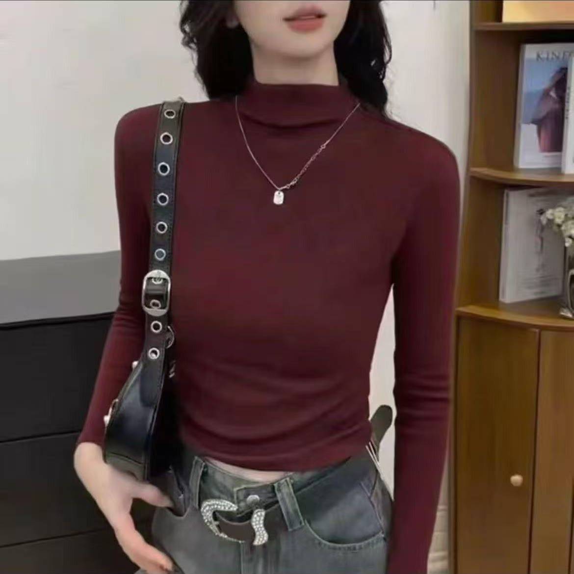 Simple and versatile half high neck base shirt for women's autumn and winter new style, small and stylish design, inner long sleeved T-shirt Simple and versatile half high neck base shirt for women's autumn and winter new style, small and stylish design, inner long sleeved T-shirt