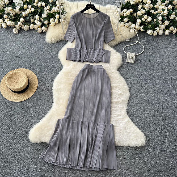 2025 Miyake Design Style Splicing European and American Set with ruffled edges, round neck short sleeved top, high waist, hip hugging skirt for women 2025 Miyake Design Style Splicing European and American Set with ruffled edges, round neck short sleeved top, high waist, hip hugging skirt for women