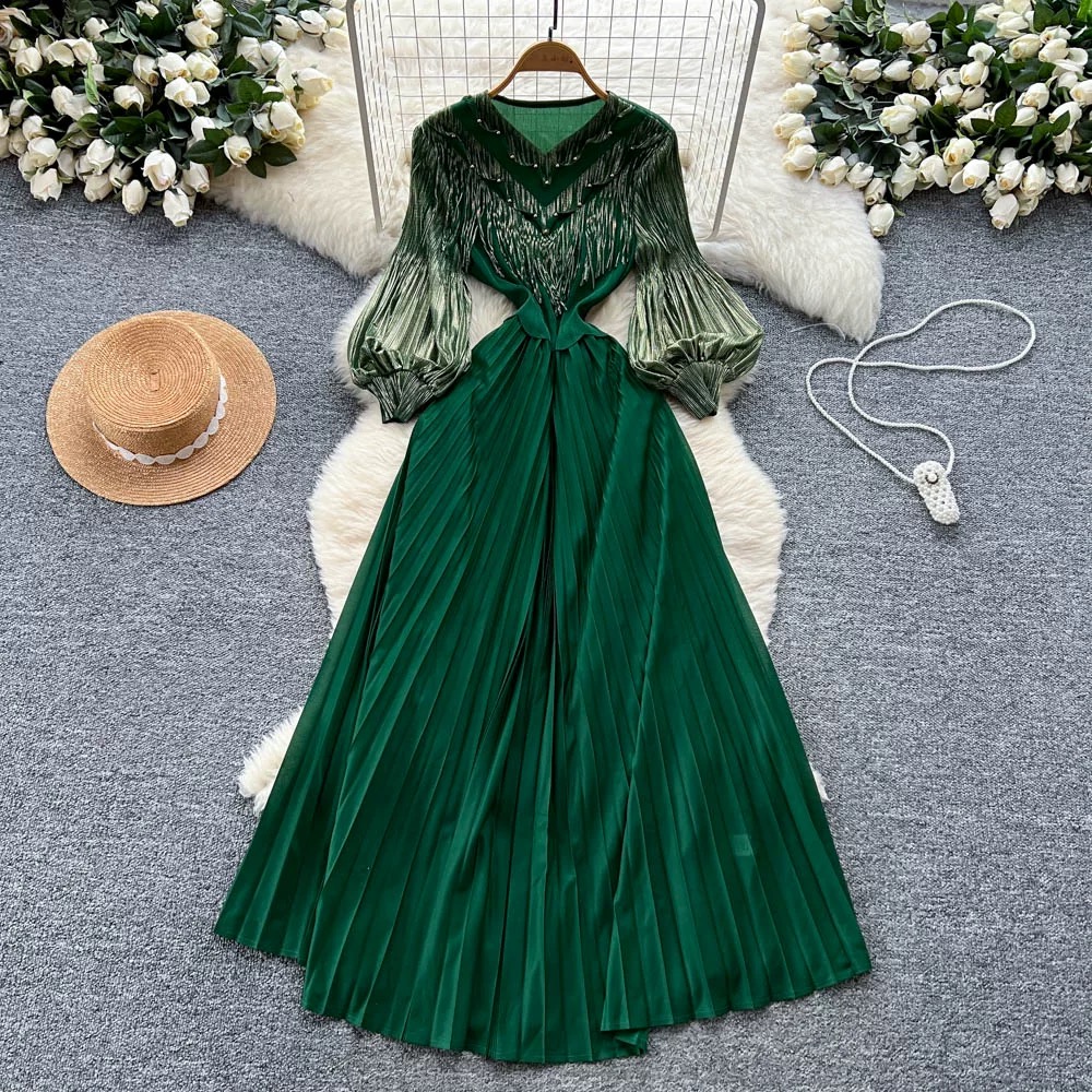 Ladies' court style bubble sleeve dress, light mature style, autumn tassel, hot stamping, pleated nail bead, large swing, women's long skirt Ladies' court style bubble sleeve dress, light mature style, autumn tassel, hot stamping, pleated nail bead, large swing, women's long skirt