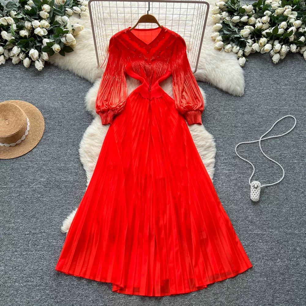 Ladies' court style bubble sleeve dress, light mature style, autumn tassel, hot stamping, pleated nail bead, large swing, women's long skirt Ladies' court style bubble sleeve dress, light mature style, autumn tassel, hot stamping, pleated nail bead, large swing, women's long skirt