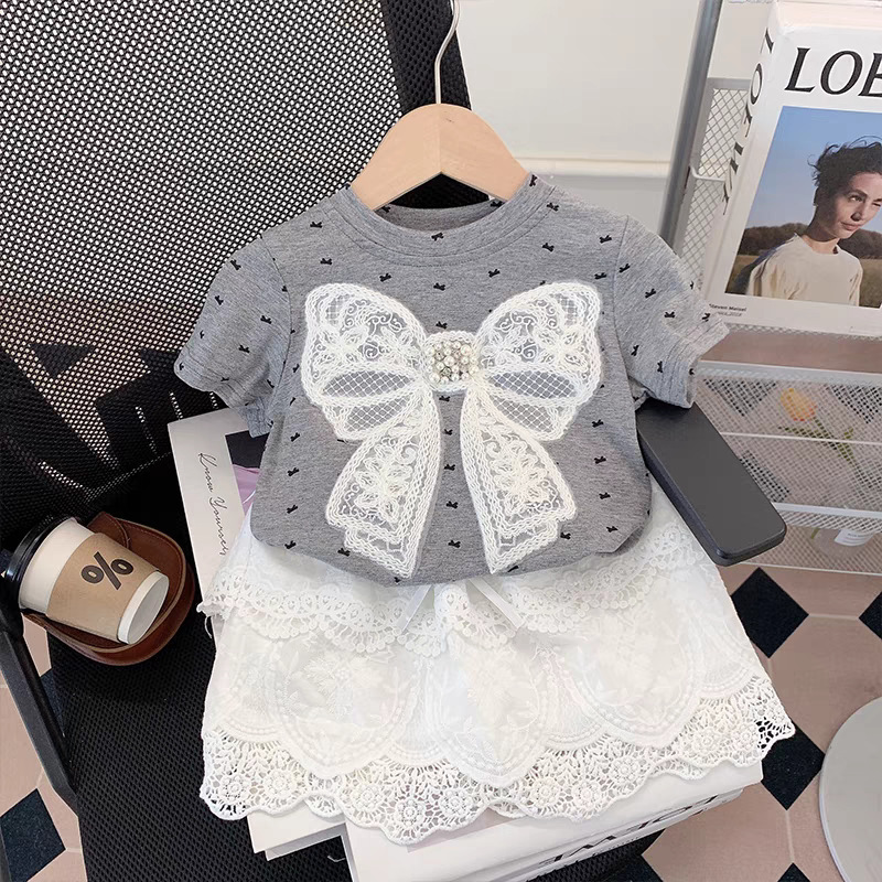 25 girls' new children's clothing lace bow top with cute princess skirt set, fashionable women's treasure set