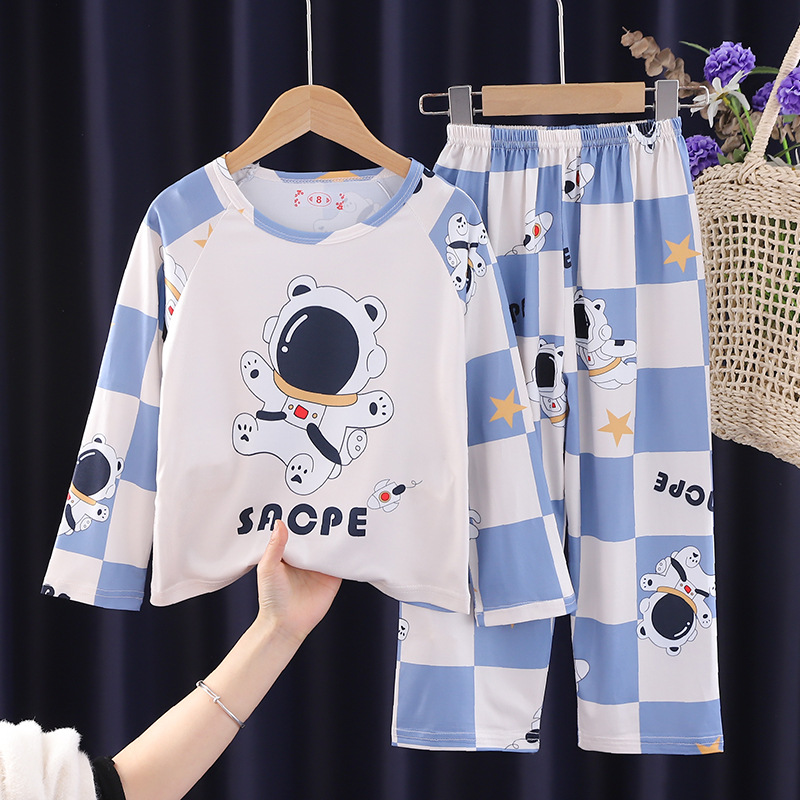 Wholesale children's pajamas, spring and autumn long sleeved pants, men's and girls' sets, cute cartoon astronaut air conditioning home clothes