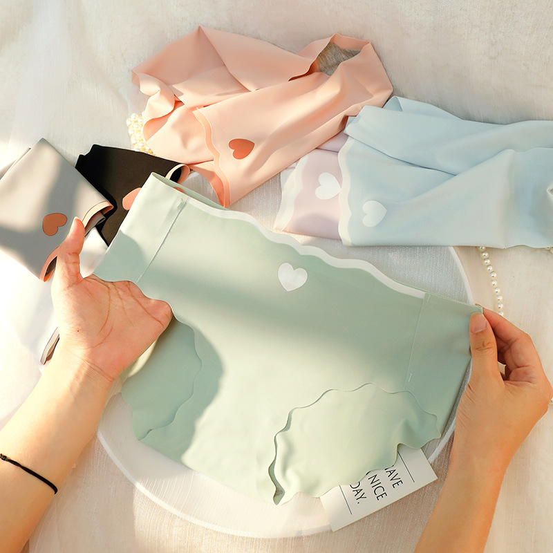 Ice silk seamless underwear for women in summer, thin, breathable, solid color, cotton, graphene, mid waist, peach heart, triangular shorts