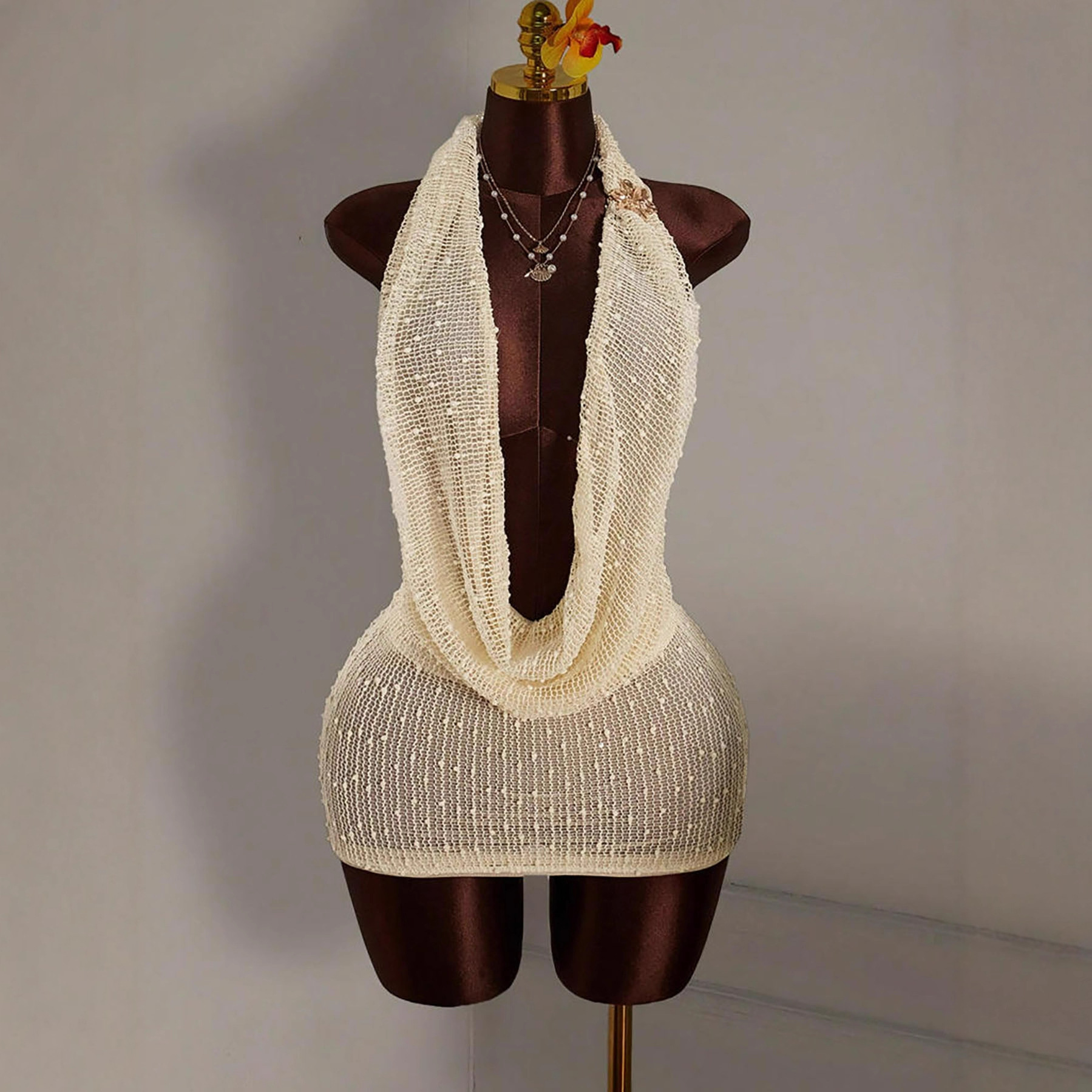 2026 Cross border European and American new sexy backless knitted beach dress, spicy girl leisure vacation beach wrapped short skirt