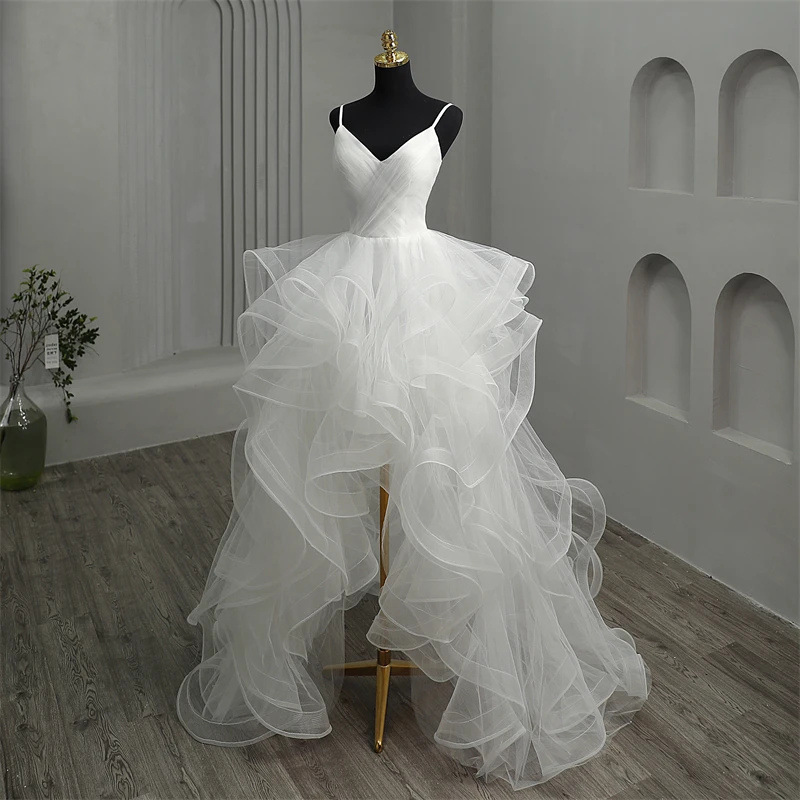 New short front and long back light wedding dress, bride's temperament is simple, super fairy, dreamy travel photography, door veil deep V sexy dress