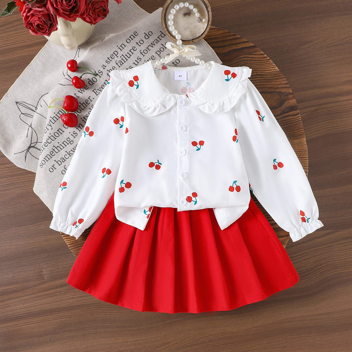 Foreign trade children's clothing casual set, cherry patterned long sleeved top, red short skirt two-piece set for baby girls
