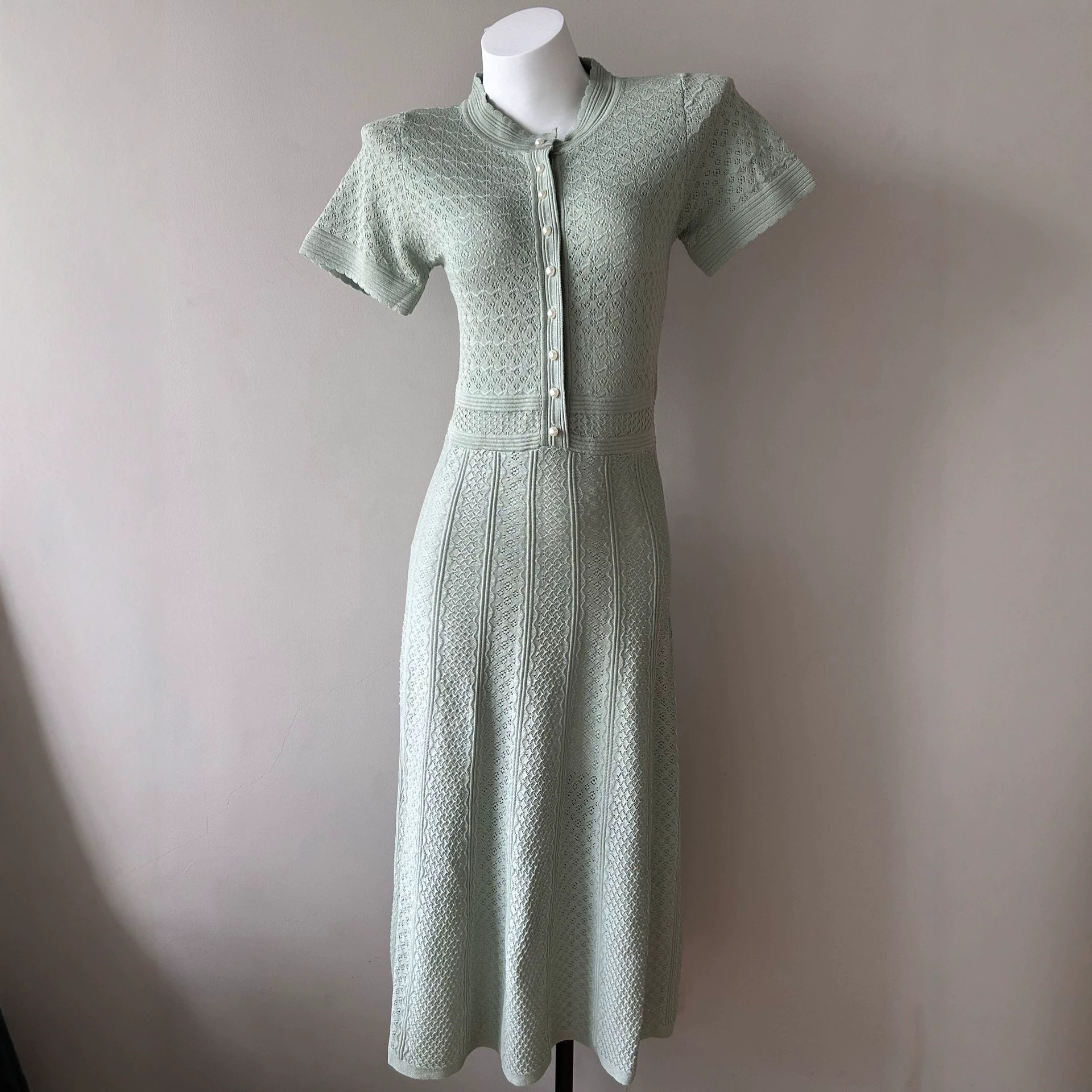 SD new pattern hollow waist collection temperament polka dot French short sleeved European and American slim fit big skirt spring and summer dress