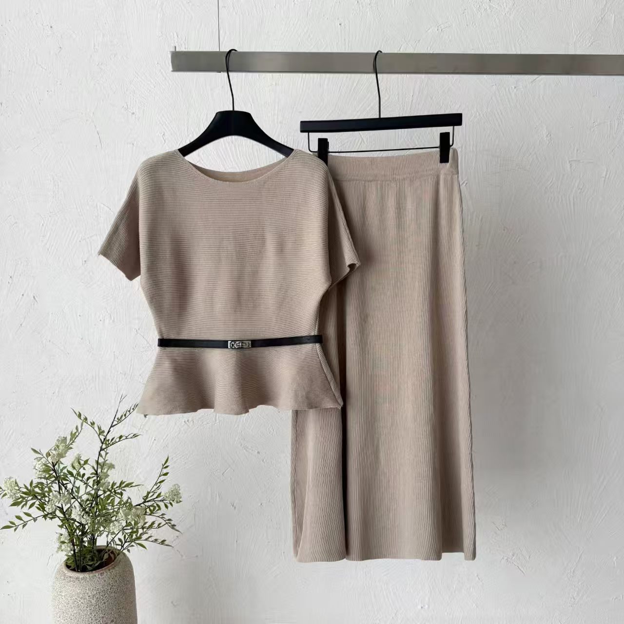 2026 new pit stripe knitted suit women's waist cinched ruffle edge top high waist straight tube half skirt two-piece set temperament 2026 new pit stripe knitted suit women's waist cinched ruffle edge top high waist straight tube half skirt two-piece set temperament