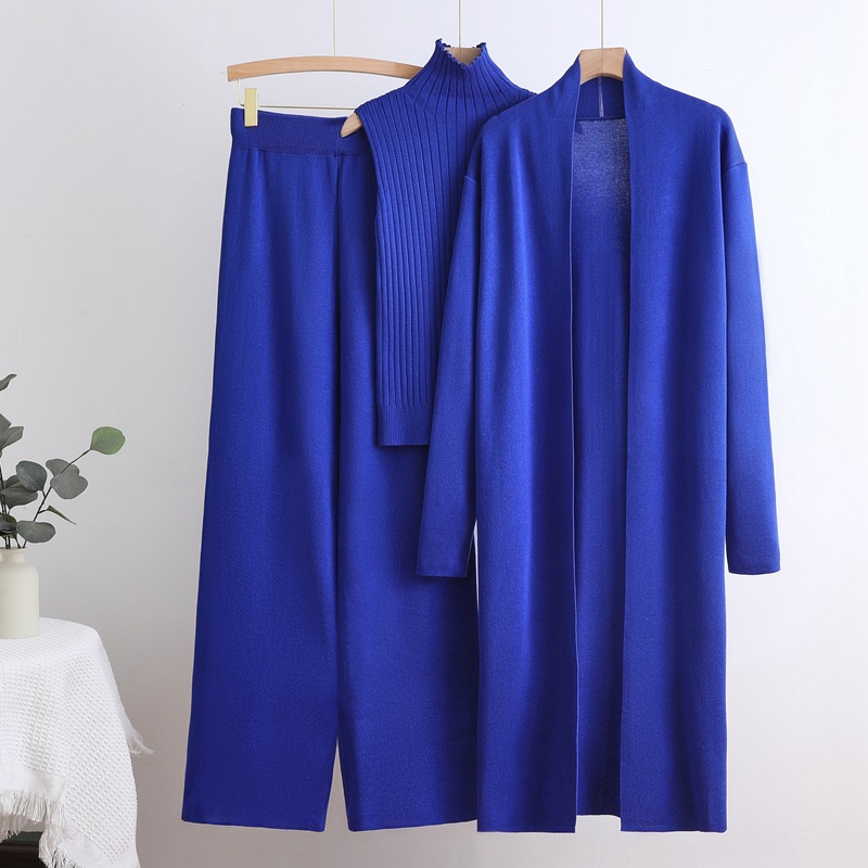 Autumn and winter goddess style long windbreaker, high neck, inner vest, sweater, elastic waist, wide leg pants, knitted three piece set Autumn and winter goddess style long windbreaker, high neck, inner vest, sweater, elastic waist, wide leg pants, knitted three piece set