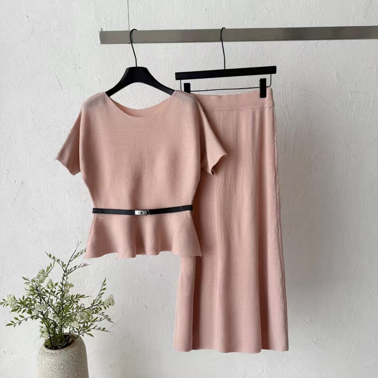 2026 new pit stripe knitted suit women's waist cinched ruffle edge top high waist straight tube half skirt two-piece set temperament 2026 new pit stripe knitted suit women's waist cinched ruffle edge top high waist straight tube half skirt two-piece set temperament