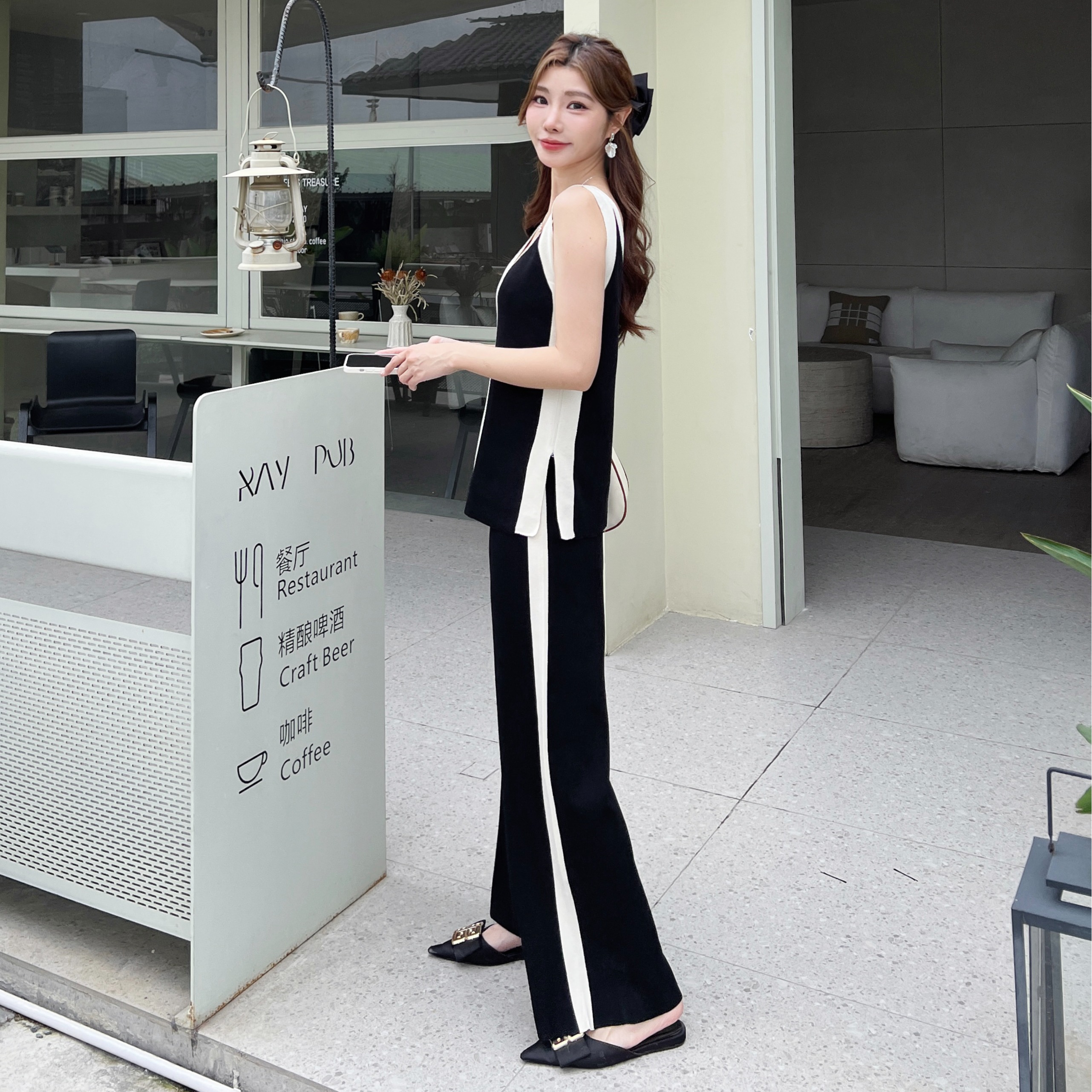 2025 new color blocked front and rear V-neck vest knitted split top color blocked wide leg pants knitted two-piece set for women 2025 new color blocked front and rear V-neck vest knitted split top color blocked wide leg pants knitted two-piece set for women