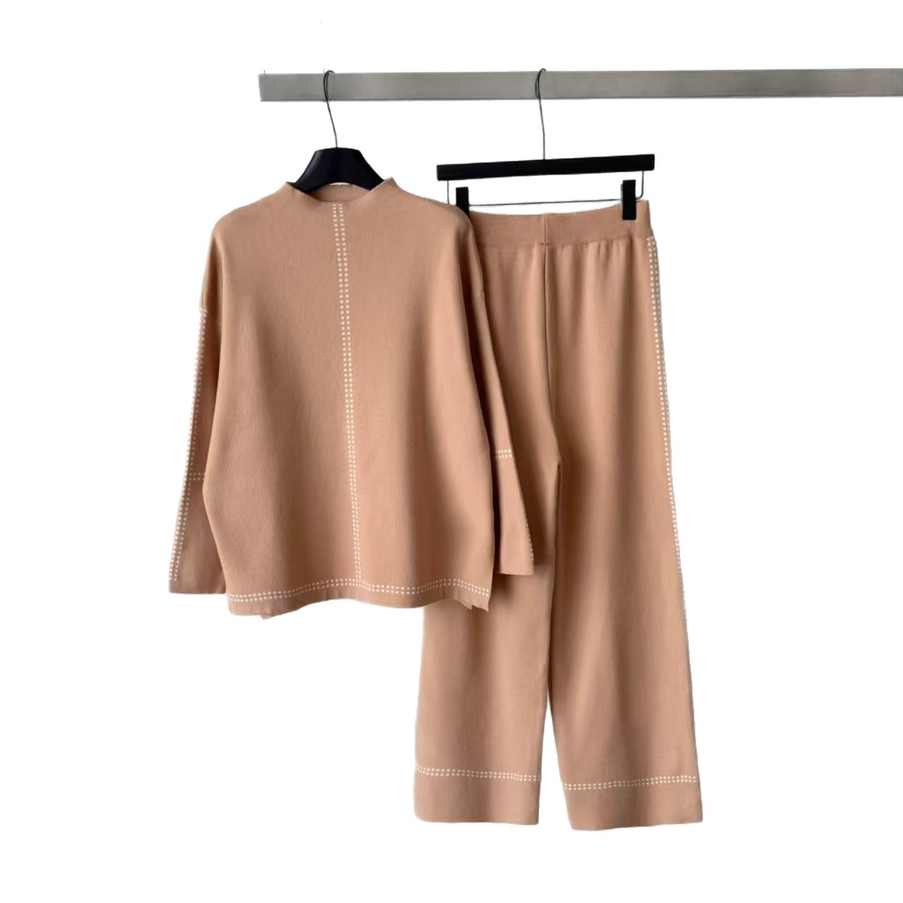 Cross border 2026 new temperament knitted suit women's loose top wide leg pants two-piece set commuting versatile fashion outfit Cross border 2026 new temperament knitted suit women's loose top wide leg pants two-piece set commuting versatile fashion outfit