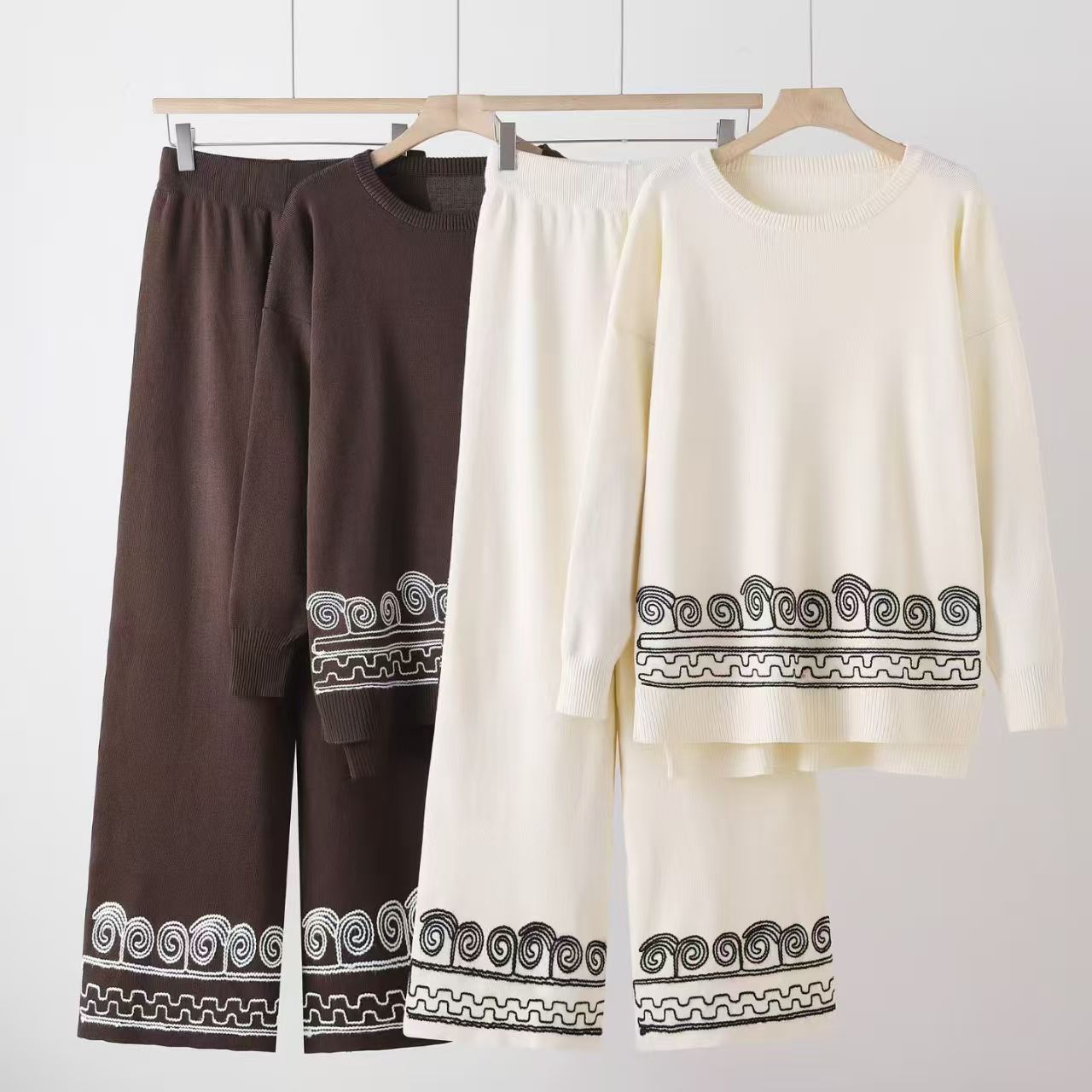 Foreign trade hooded knitted suit women's 2026 spring and autumn zipper cardigan pocket top wide leg pants two-piece set