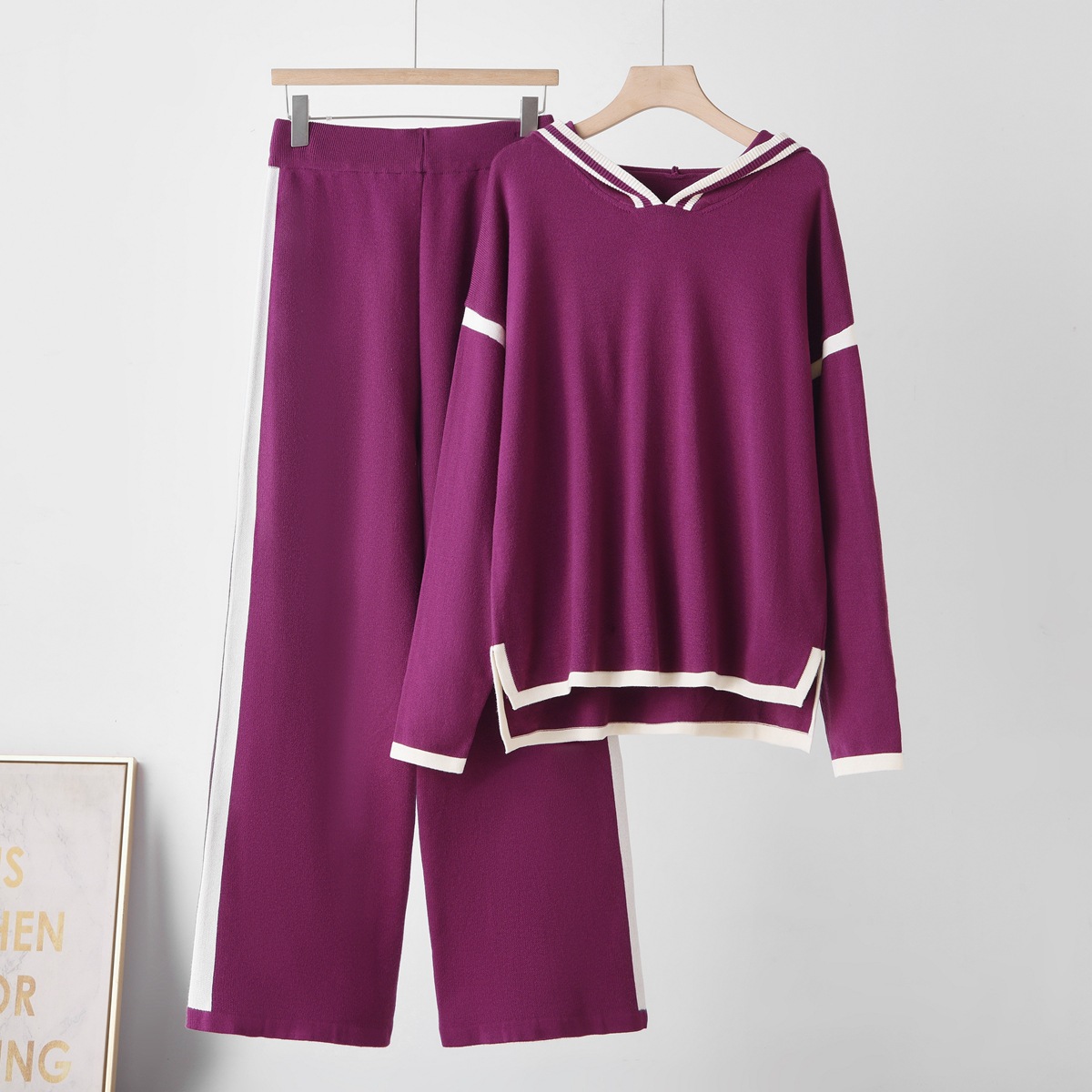 Cross border fashion color blocked hooded knitted suit 2026 women's loose temperament slimming sweater wide leg pants two-piece set Cross border fashion color blocked hooded knitted suit 2026 women's loose temperament slimming sweater wide leg pants two-piece set