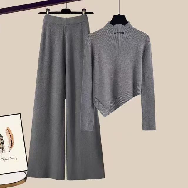 Cross border fashion set for early spring, new women's clothing, irregular sweaters, pants, tea lined tea air knitted two-piece set for women Cross border fashion set for early spring, new women's clothing, irregular sweaters, pants, tea lined tea air knitted two-piece set for women
