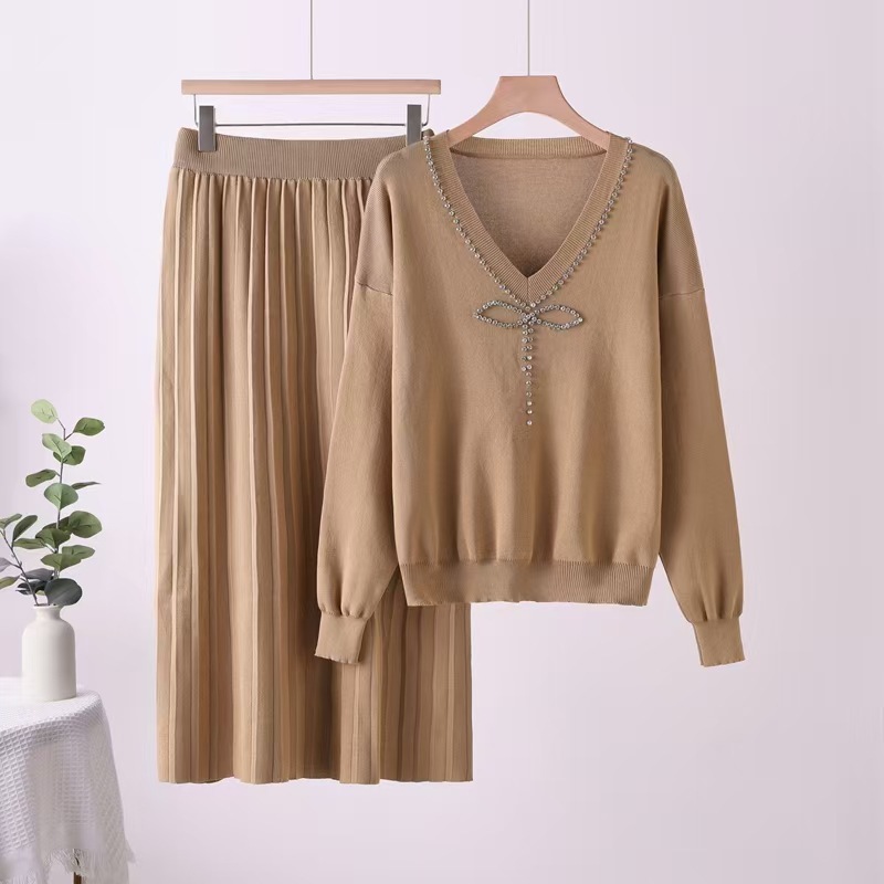 Fashionable two-piece women's autumn and winter light luxury goddess style temperament bow V-neck knitted sweatshirt set pleated long skirt