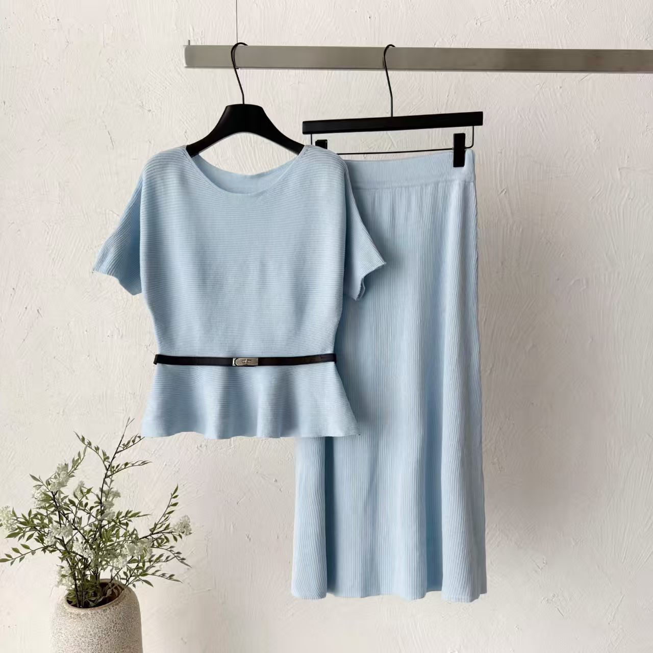 2026 new pit stripe knitted suit women's waist cinched ruffle edge top high waist straight tube half skirt two-piece set temperament 2026 new pit stripe knitted suit women's waist cinched ruffle edge top high waist straight tube half skirt two-piece set temperament