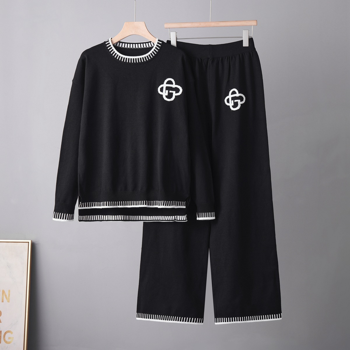 Cross border fashion woolen suit from Europe and America, autumn and winter knitted top+casual sports wide leg pants knitted two-piece set for women