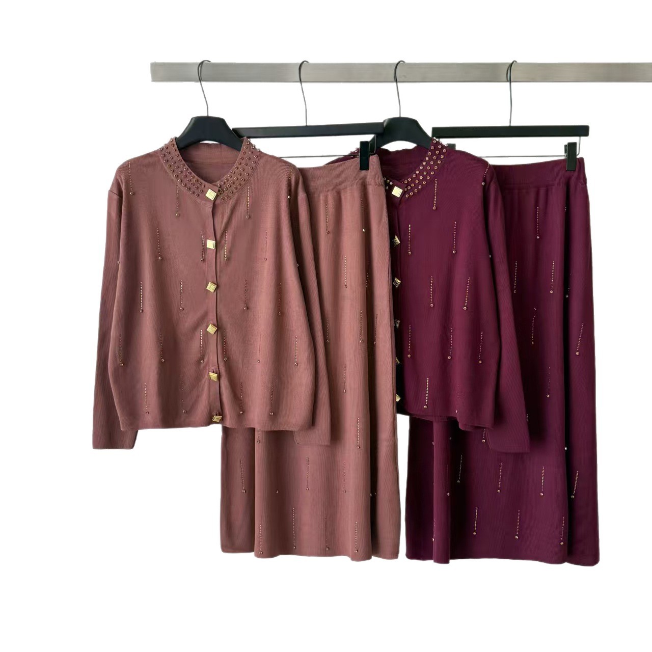 2026 Heavy Industry Nail Bead Knitted Women's Spring and Autumn Round Neck Gold Buckle Cardigan High Waist Half length Long Dress Two Piece Set Foreign Trade 2026 Heavy Industry Nail Bead Knitted Women's Spring and Autumn Round Neck Gold Buckle Cardigan High Waist Half length Long Dress Two Piece Set Foreign Trade