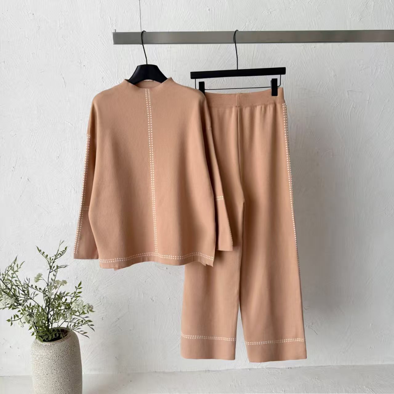 Cross border 2026 new temperament knitted suit women's loose top wide leg pants two-piece set commuting versatile fashion outfit Cross border 2026 new temperament knitted suit women's loose top wide leg pants two-piece set commuting versatile fashion outfit